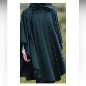NWT Jimmy Hourihan Molina hooded walking cape. 
This specific style is a wool an